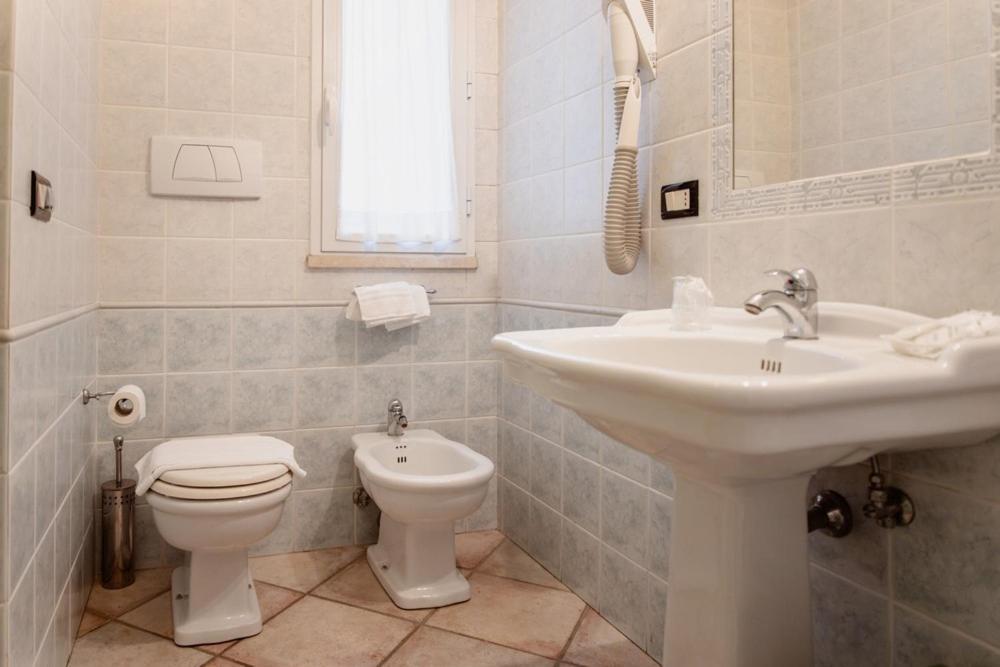 Hotel Rossi Манчиано Экстерьер фото